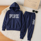 Unisexoversized hoodies & sweatpants i enfärgad modell